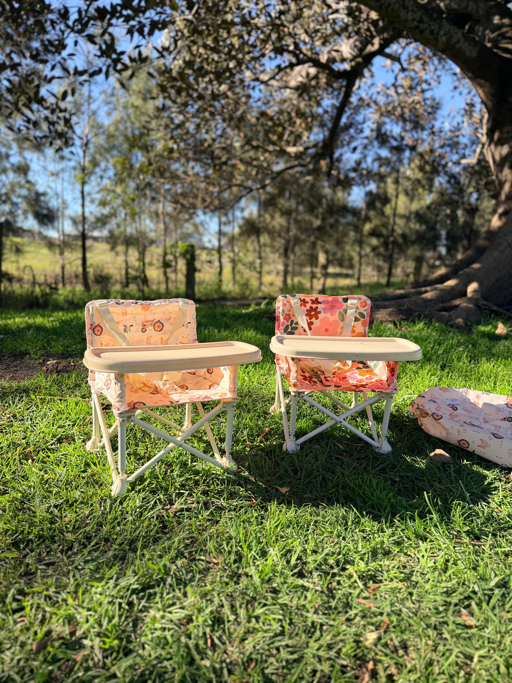 Campie Chair - Portable High Chair in use