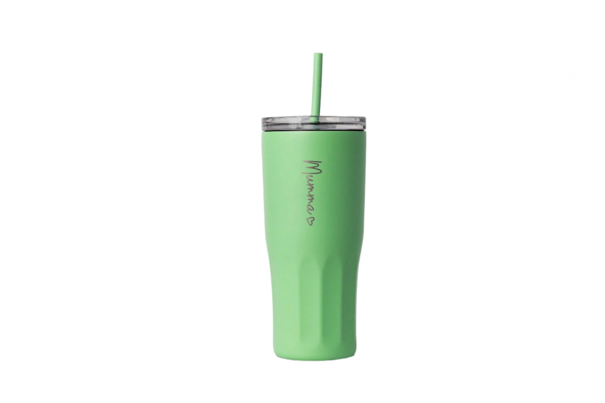 Green tumbler with a straw on a marble surface