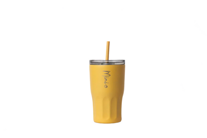 Yellow tumbler with a straw on a marble surface