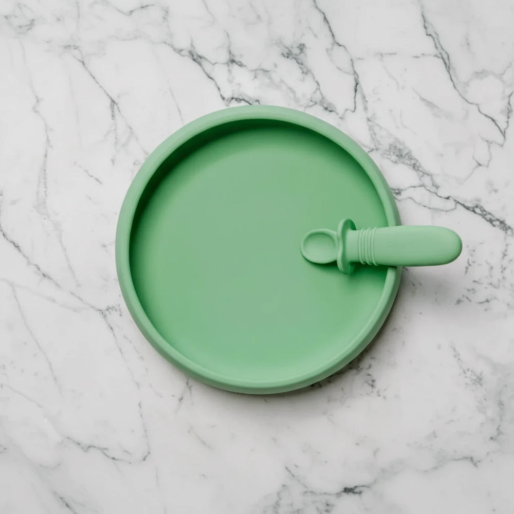 Suckie Scoop Silicone Suction Plate in use
