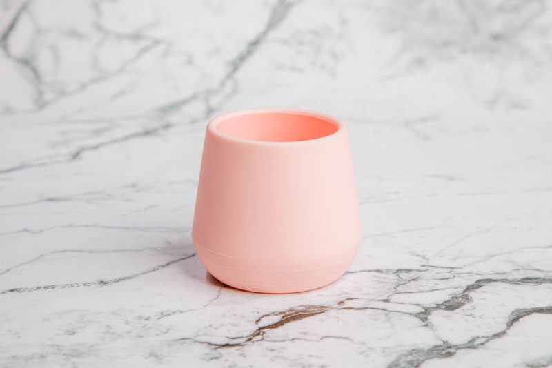 Bubbie Cup by Starting Solids Australia in 'Fair Floss' pink on a marble bench