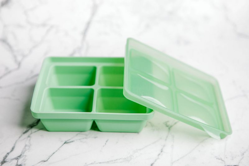 'Mint Crisp' green Freezie Tray by Starting Solids Australia on a marble bench.