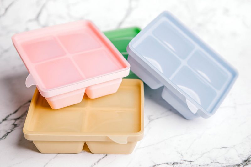 Freezie Trays by Starting Solids Australia in assorted colours on a marble bench.