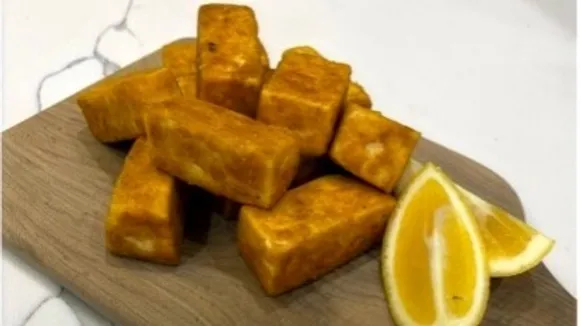 Tofu Nuggets and lemon wedge on wooden board - Starting Solids Australia recipe.