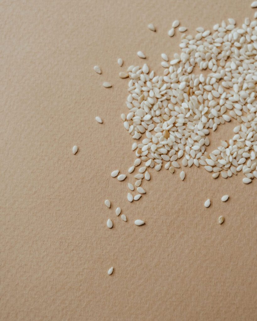 Scattered sesame seeds for Starting Solids Australia resource article